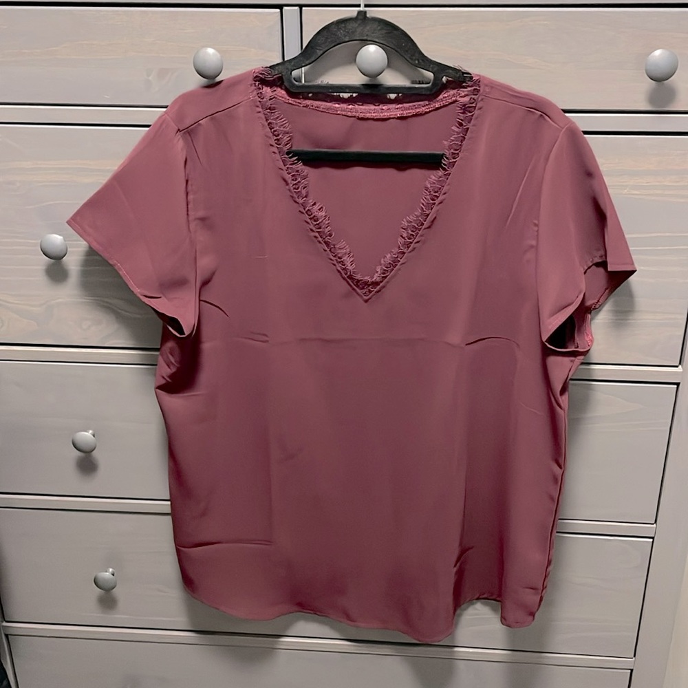 Maroon, short sleeve shirt with rustic v-shaped neckline.
